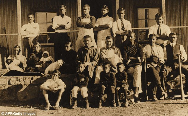 Gandhi and Kallenbach (middle row, centre) pose for a picture at Tolstoy Farm, South Africa in 1910. They became constant companions after they met in Johannesburg in 1904