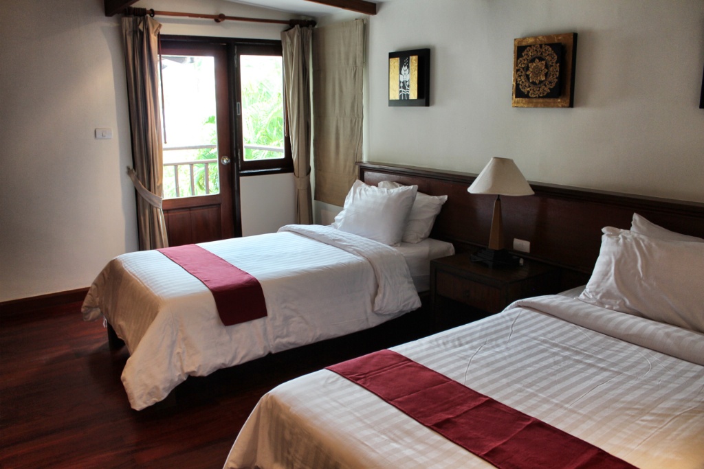 Two single bed room in The Village Coconut Island