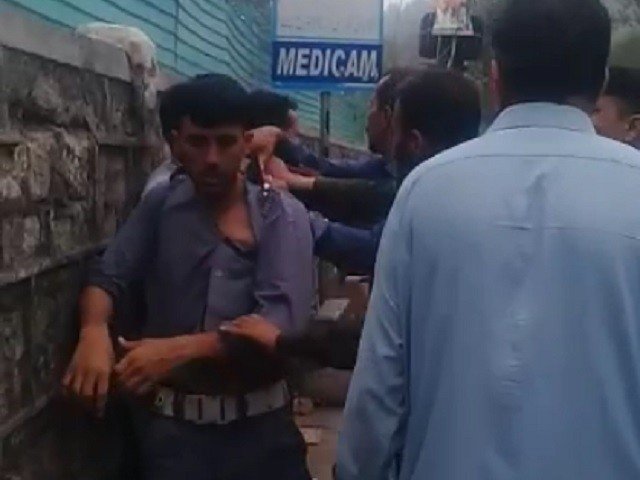 Boycott Murree - Traffic warden beaten up