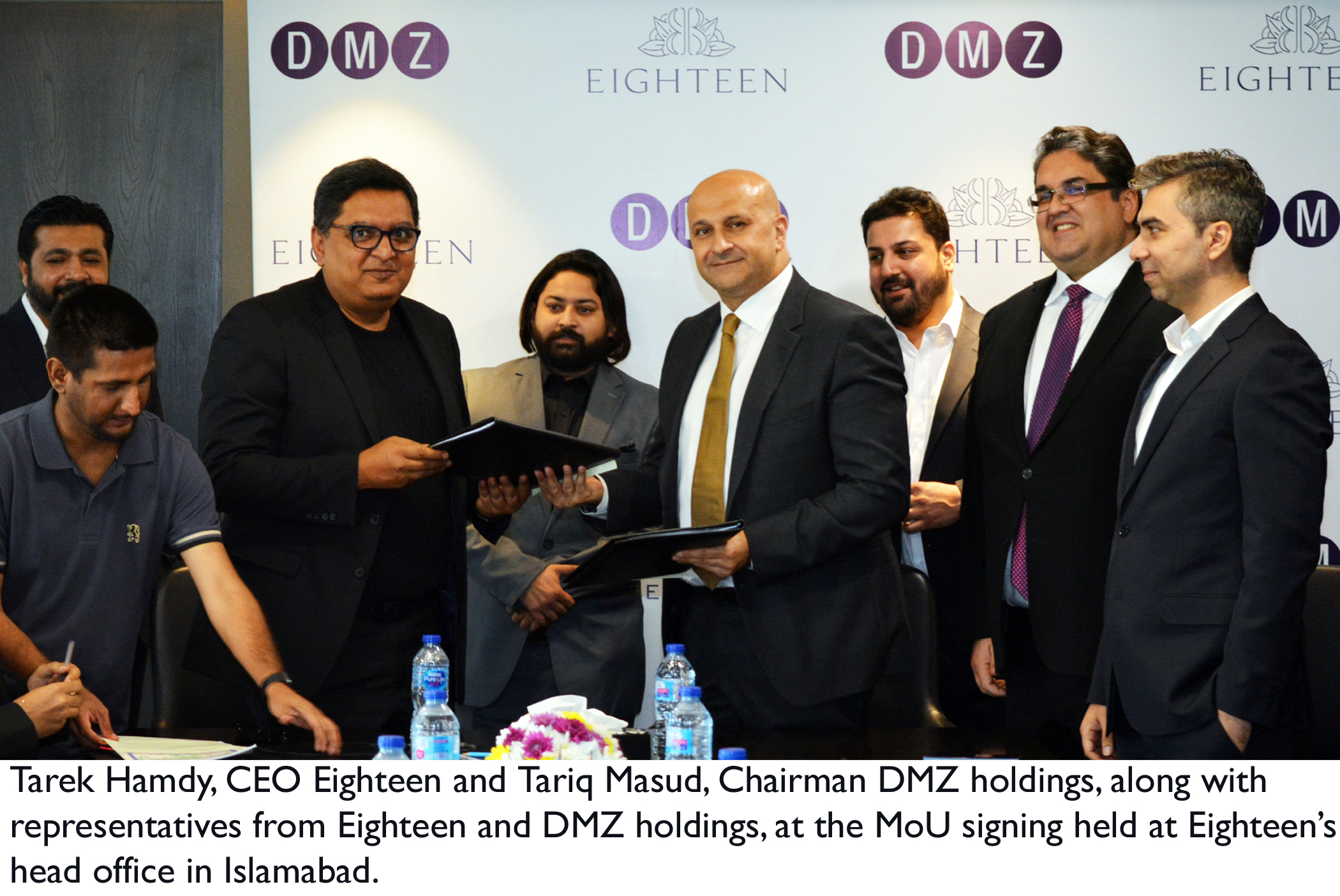 Eighteen, DMZ Holdings, Signing